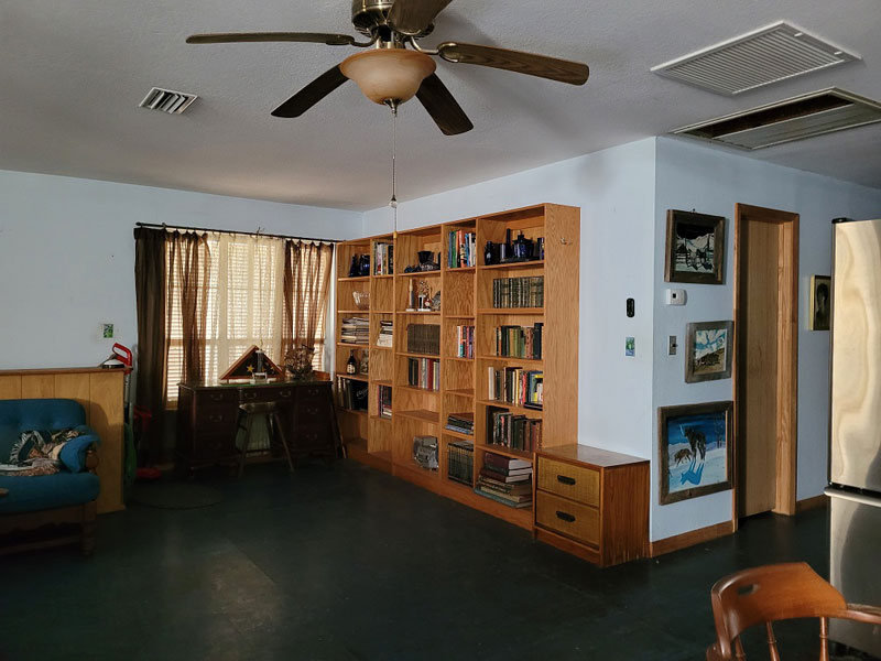 View of living area and bookcases